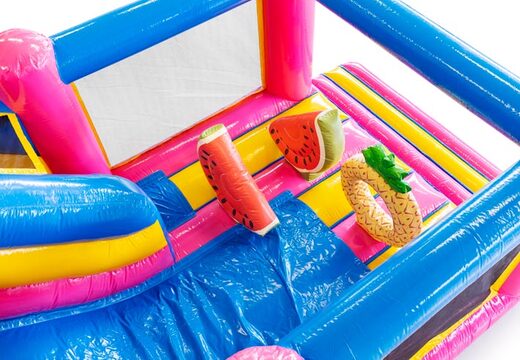 Slide and obstacles on bouncy castle with flamingo theme